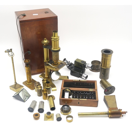 505 - A lacquered brass microscope by J. Lizars of Glasgow, housed in a mahogany travel case; with a quant... 