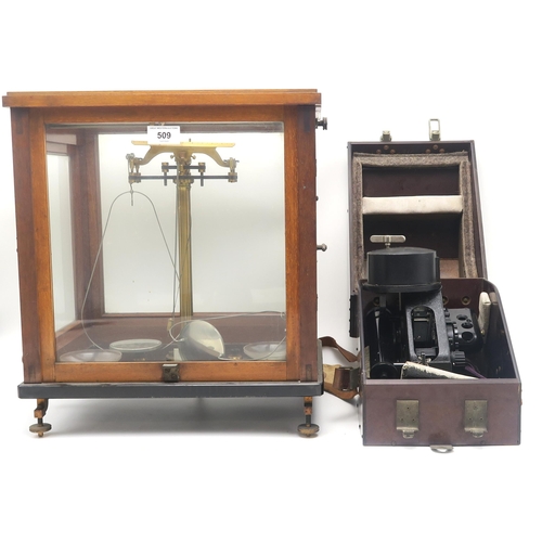 509 - Cased laboratory scales by Bunge of Hamburg, a Mitsubishi projector in soft case, a small Victorian ... 