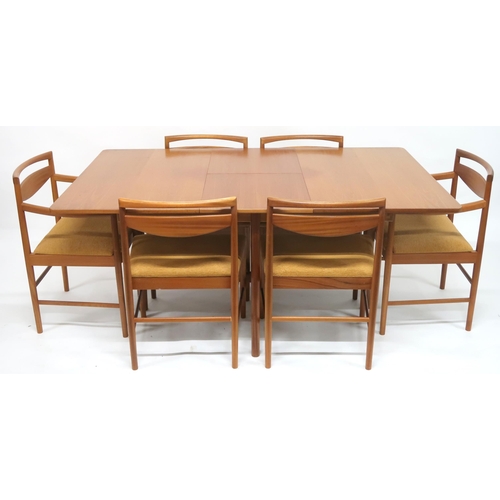 95 - A MID 20TH CENTURY TEAK A.H MCINTOSH & CO LTD OF KIRKCALDY TEAK EXTENDING DINING TABLE AND SIX C... 