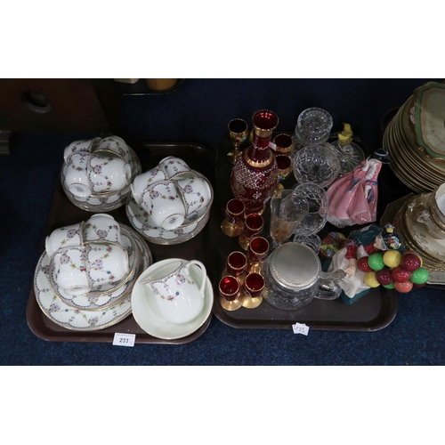 233 - A Queen's China teaset, other teawares, two Royal Doulton figures, a red glass liquor set etc