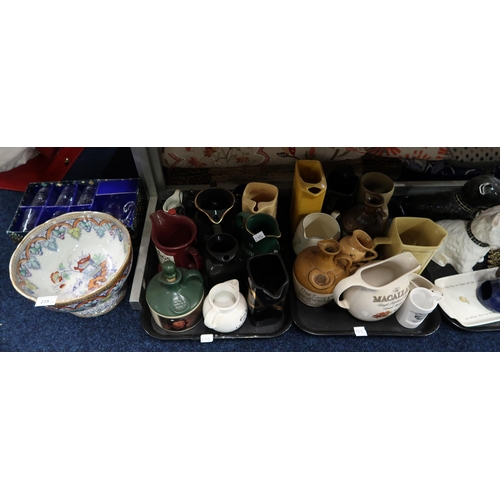 235 - Assorted ceramics including Whisky water jugs, Carlton Ware, dog figures