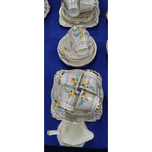 292 - A Royal Doulton H4135 pattern tea set, decorated with colourful trailing convolvulus, together with ... 