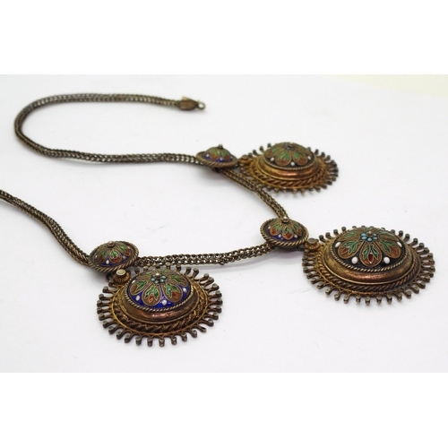 2703 - A SCANDINAVIAN TRADITIONAL NECKLACEmade in gilded white metal (stamped 830) decorated with cloisonne... 