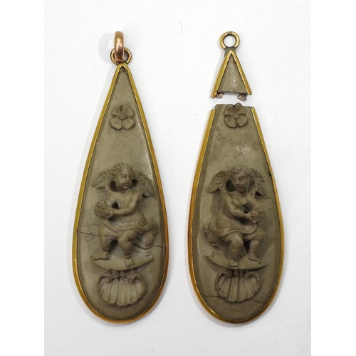 2707 - A PAIR OF LAVA EARRINGSboth carved with cherubs, flowers and shells. Both need some TLC and a pair o... 