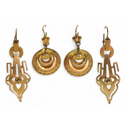 2708 - TWO PAIRS OF VICTORIAN EARRINGSboth made in bright yellow metal. the longer pair with granulation de... 