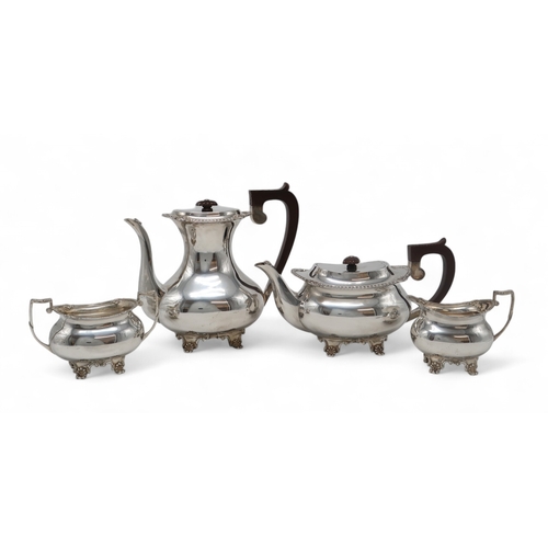 2351 - A GEORGE VI FOUR PIECE SILVER TEA SERVICEby Charles S Green & Co Ltd, the teapot, sugar bowl and... 