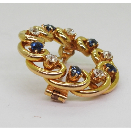 2722 - TWO BROOCHESa bright yellow metal knot shaped brooch, set with old cut diamonds with an estimated ap... 