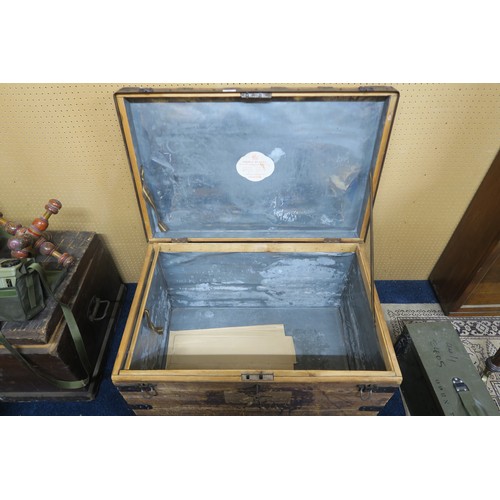 126 - A lot consisting an early 20th century metal bound chest and another pine chest both containing asso... 