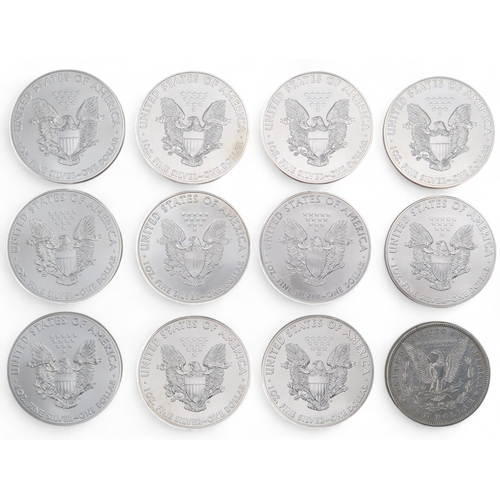 456 - A lot comprising various silver 1oz coins to include Liberty Dollars, Britannia Crowns etc (29)