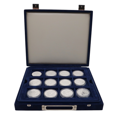 369 - A lot comprising 36 silver 1 oz coins approximate weight 1000 grams in a collector's box