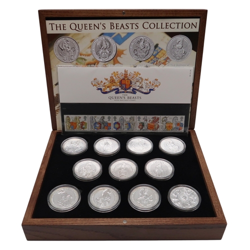 370 - The Queen's Beasts a set of 10 2 oz silver coins together with a silver 2 oz £5