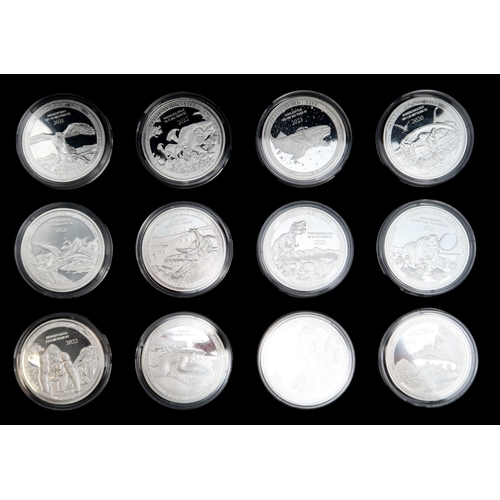 374 - A lot comprising various commemorative silver coin sets with Apollo II, World Of Dragons etc, 30 coi... 