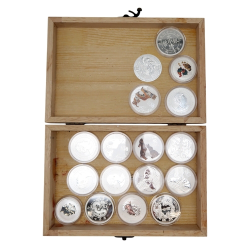 379 - Various Chinese zodiac silver coins with three collector's cases approximate weight 1200 grams