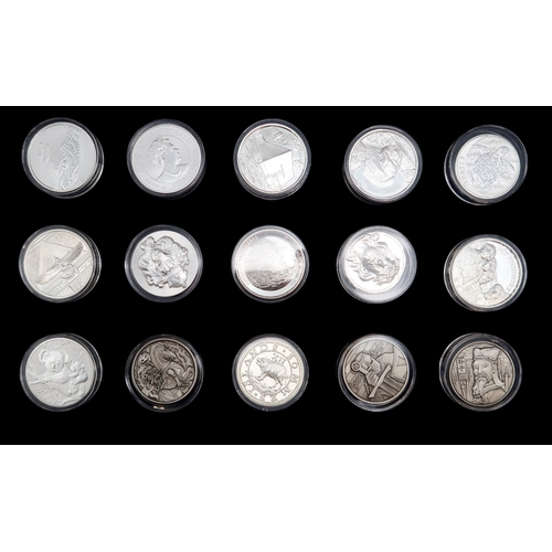 380 - A lot comprising fifteen various 2 oz silver commemorative coins approximate weight 820 grams