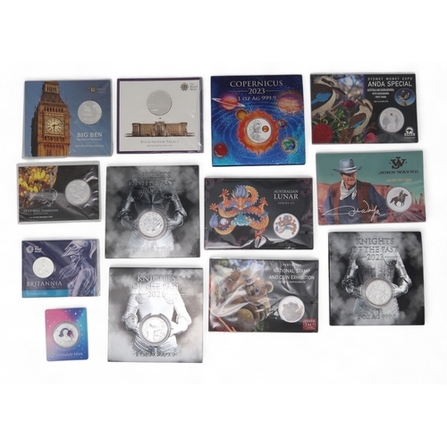 391 - A lot comprising various silver coins Harry Potter, Star Wars, The Snowman etc