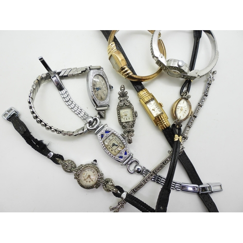 889 - A collection of vintage gold filled and white metal ladies watches to include Bulova, Longines, Majo... 