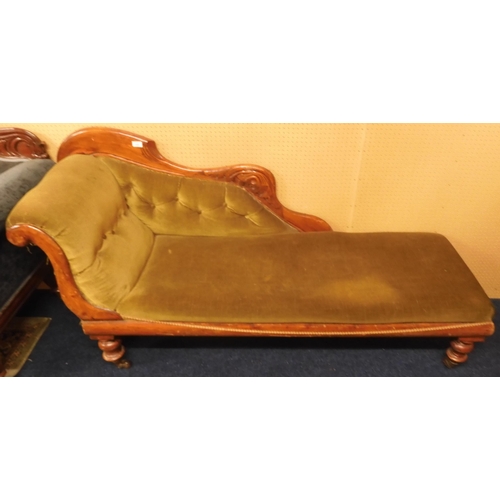 115 - A Victorian mahogany framed green upholstered chaise longue with scrolled end on turned supports, 89... 