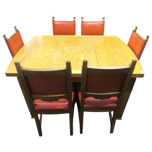 1 - An early 20th century blonde oak arts & crafts style dining suite consisting extending pull out ... 