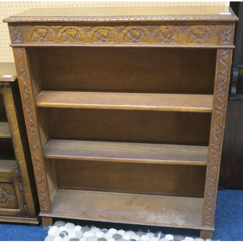 119 - An early 20th century oak open bookcase with gadrooned top over three open shelves on bracket suppor... 