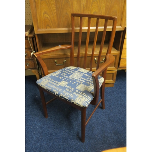 62 - A mid 20th century Scottish teak McIntosh extending dining table and six chairs, table with shaped t... 