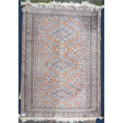 68 - A beige ground Persian style rug with geometric patterned ground within multicoloured border, 176cm ... 