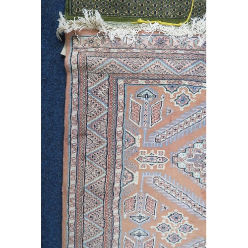 68 - A beige ground Persian style rug with geometric patterned ground within multicoloured border, 176cm ... 