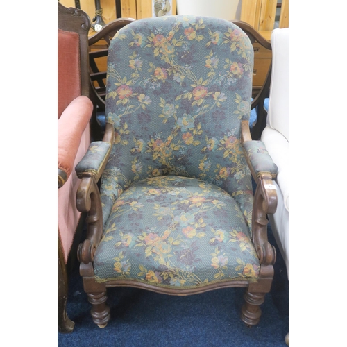 69 - A Victorian walnut framed slipper library chair with floral floral upholstered seat flanked by carve... 