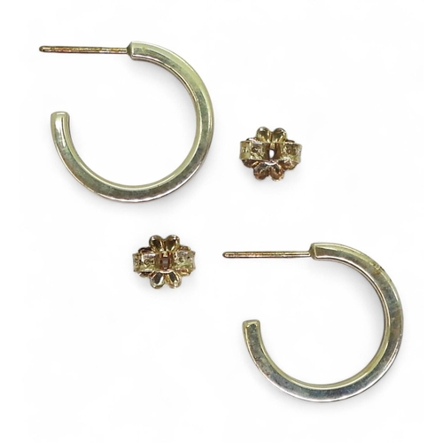 704 - A pair of silver Tiffany & Co hoop earrings, full T&Co hallmarks to both the post and butter... 