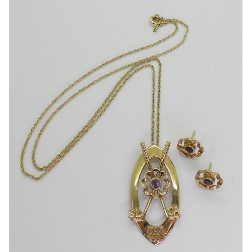 737 - A 9ct gold golf themed pendant set with an amethyst on a 52cm long rope chain and matching earrings,... 