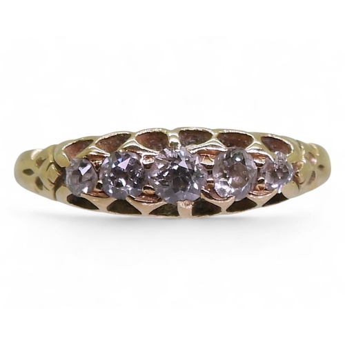 787 - An 18ct gold five stone diamond ring, set with estimated approx 0.20cts of old cut diamonds, size K1... 