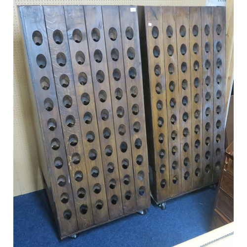 79 - A lot of two 20th century hardwood A framed freestanding wine rack/bottle holders stamped Champagne ... 