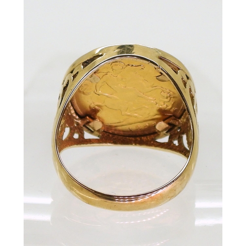 798 - An 1898 re strike half sovereign ring in a 9ct gold mount, size U, weight 8.6gms