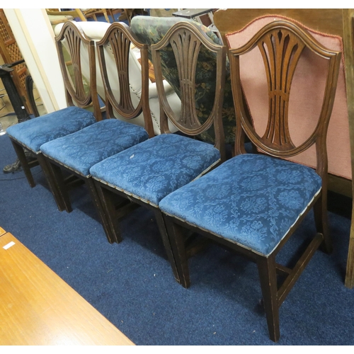 87 - A set of four 19th century mahogany framed shield back dining chairs with blue floral embossed uphol... 