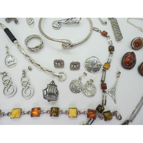 887 - A collection of silver and costume jewellery to include items made by John Hart, Ola Gorie and a She... 