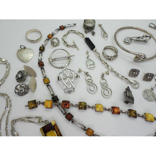 887 - A collection of silver and costume jewellery to include items made by John Hart, Ola Gorie and a She... 