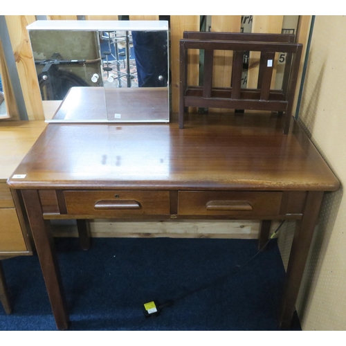 89 - A 20th century stained teak two drawer desk, two door bathroom cabinet and a stained teak magazine r... 