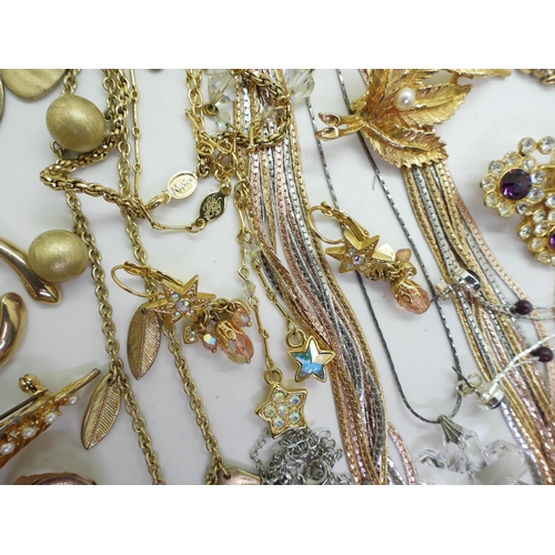 896 - A collection of costume jewellery to include Kirks Folly :- Star necklace and earrings, and a pair o... 