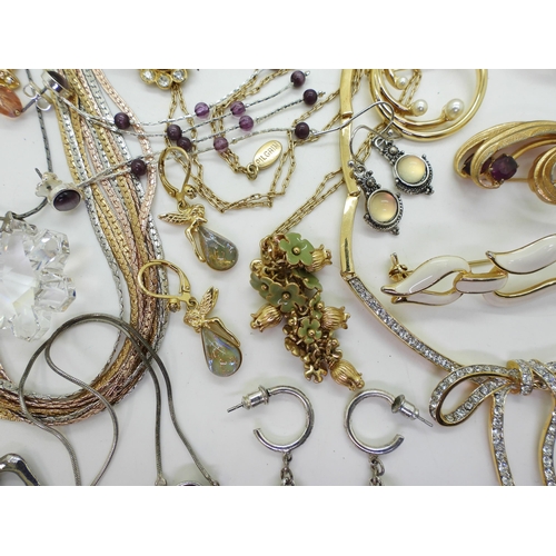 896 - A collection of costume jewellery to include Kirks Folly :- Star necklace and earrings, and a pair o... 