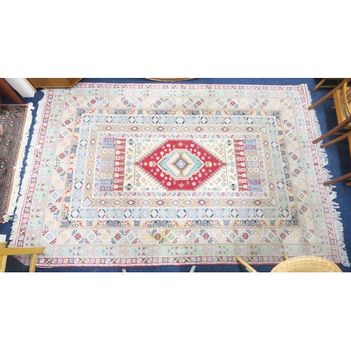 93 - A multicoloured ground Persian rug with red central medallion within numerous multicoloured borders,... 