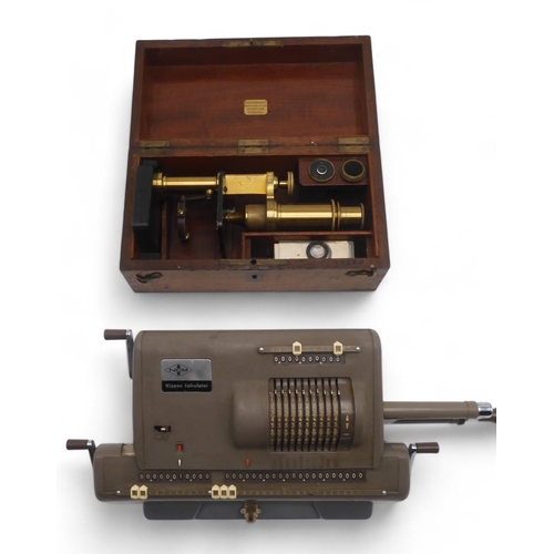 518 - A Nipon NCM mechanical calculator, serial no. 263607; and a lacquered brass monocular microscope, ho... 