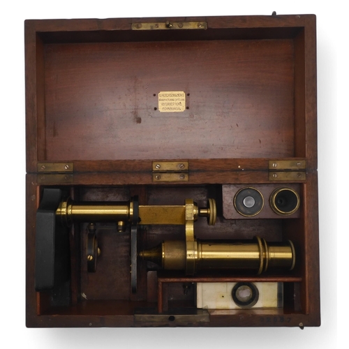 518 - A Nipon NCM mechanical calculator, serial no. 263607; and a lacquered brass monocular microscope, ho... 