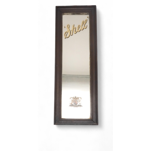 522 - A narrow Shell advertising mirror, with Royal Warrant coat of arms to the lower portion, 