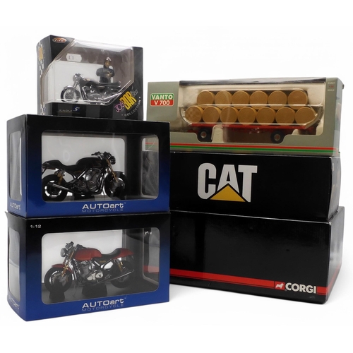 543 - Two Autoart 1:12-scale Norton Commando 952 motorcycles, a Solido 1:18-scale Norton Commando, Caterpi... 