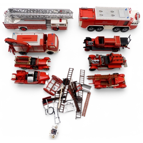 544 - A collection of boxed and loose die-cast model vehicles, to include German fire service examples by ... 