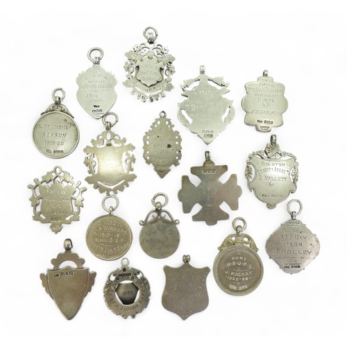 553 - A collection of late-19th/early-20th century hallmarked silver football fob medals, to include Hamil... 