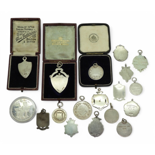 558 - A collection of silver sporting fob medals, to include a late-Victorian enamelled Bishop Auckland Di... 