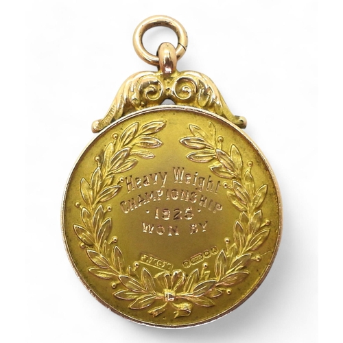 560 - A substantial 9ct gold Scottish Sports National Association Heavyweight Championship 1925 medal by J... 