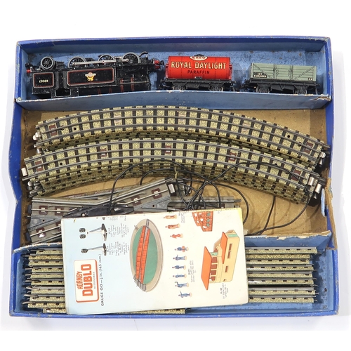 656 - *AMENDED* Boxed Horny Dublo 00-gauge electric and 0-gauge train sets, with a power control unit Plea... 