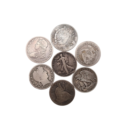 324 - United Stares (1776-date) A lot comprising half dollars various dates