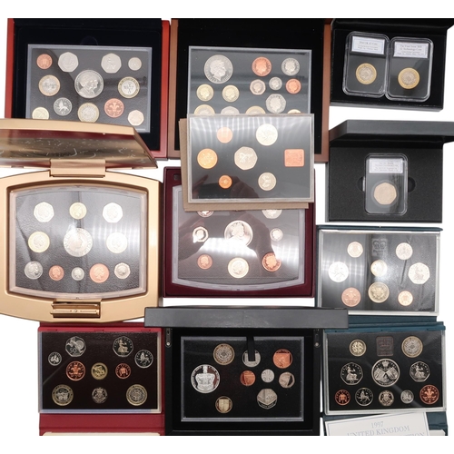 492 - Elizabeth II (1952-2022) A lot comprising various proof coin sets with COA to include 2003 Gold... 